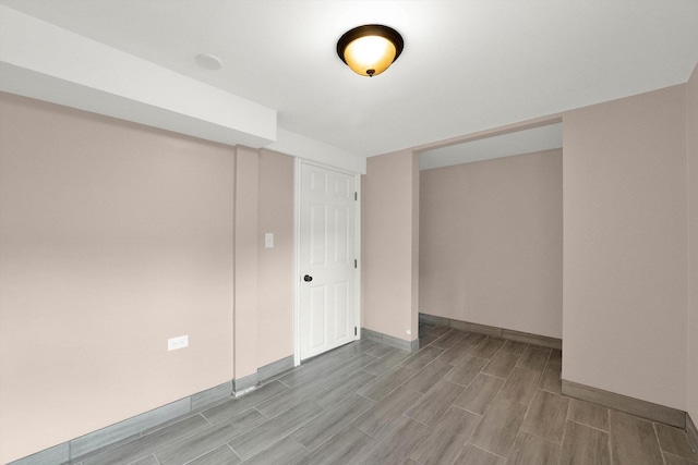 basement featuring light hardwood / wood-style floors