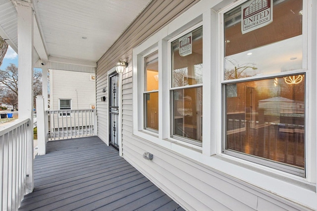 wooden terrace featuring a porch