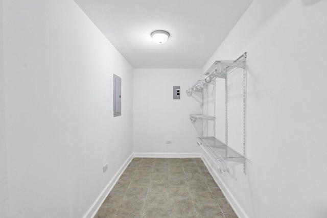 walk in closet featuring electric panel