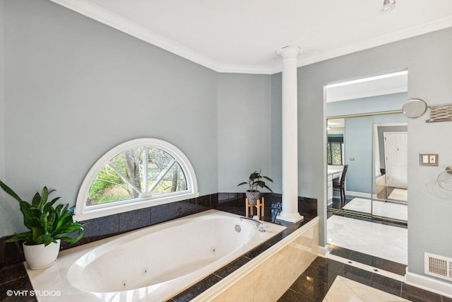 bathroom with visible vents, crown molding, and ornate columns