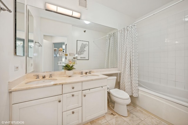 full bathroom with shower / bath combination with curtain, vanity, toilet, and tile patterned floors