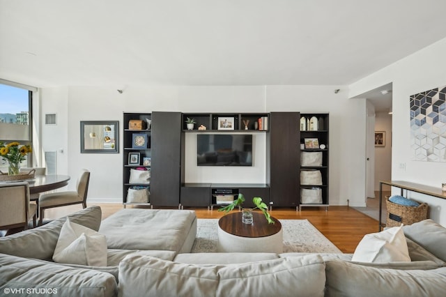 living room with light hardwood / wood-style floors