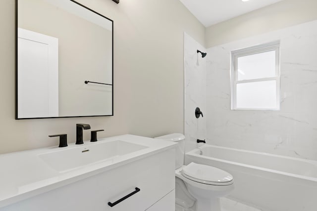 full bathroom featuring vanity, toilet, and tiled shower / bath