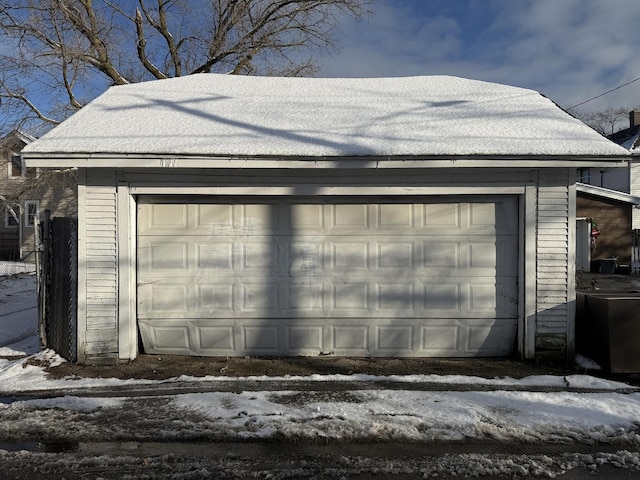 view of snow covered garage