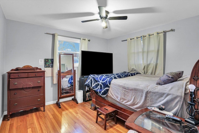 bedroom featuring light hardwood / wood-style floors and ceiling fan