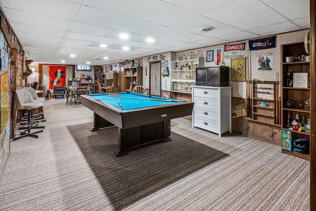 game room featuring a paneled ceiling, billiards, and light carpet