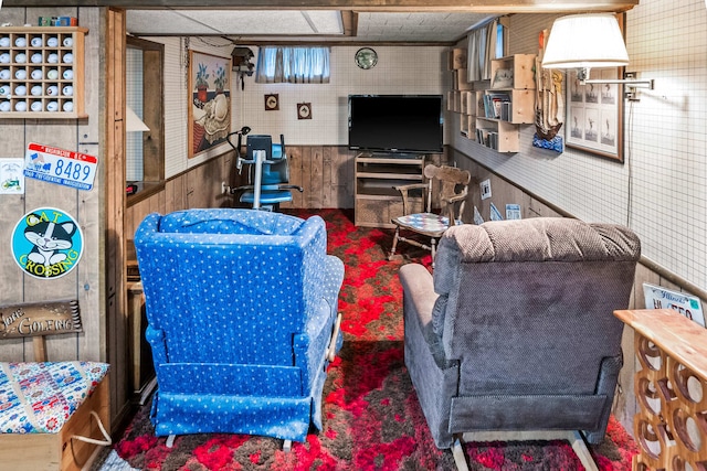 living room with wooden walls