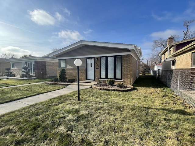 view of front of property with a front lawn