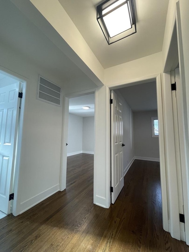 hall featuring dark hardwood / wood-style flooring