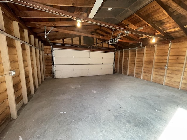 garage featuring a garage door opener