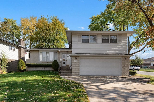 view of front of home featuring a garage and a front lawn