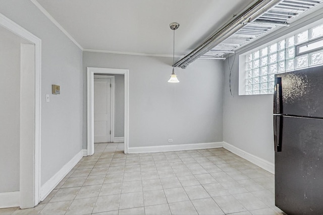 unfurnished dining area featuring ornamental molding