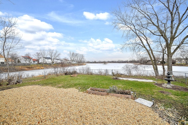 view of yard with a water view