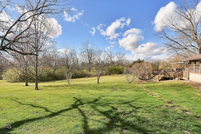 view of yard featuring a deck