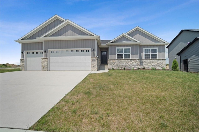 craftsman inspired home with a garage, concrete driveway, board and batten siding, and stone siding