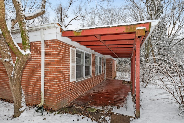 view of snow covered property