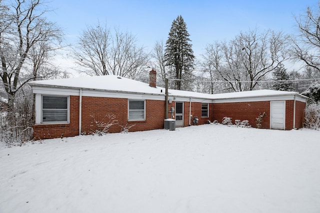 view of snow covered house