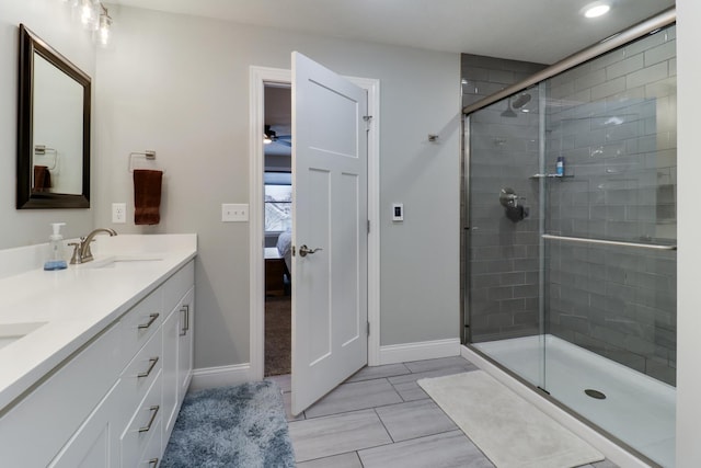 bathroom featuring vanity and walk in shower