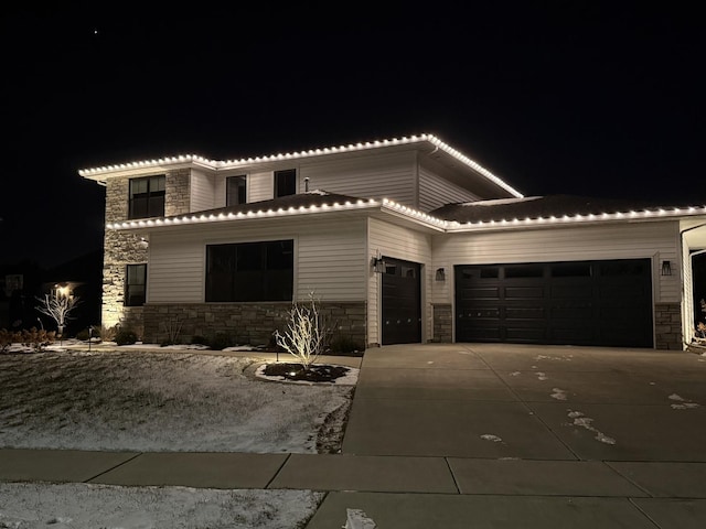 view of front of home with a garage