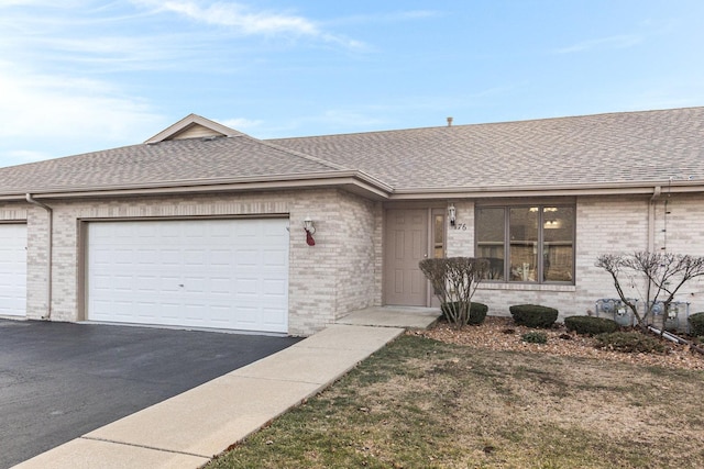 ranch-style house featuring a garage