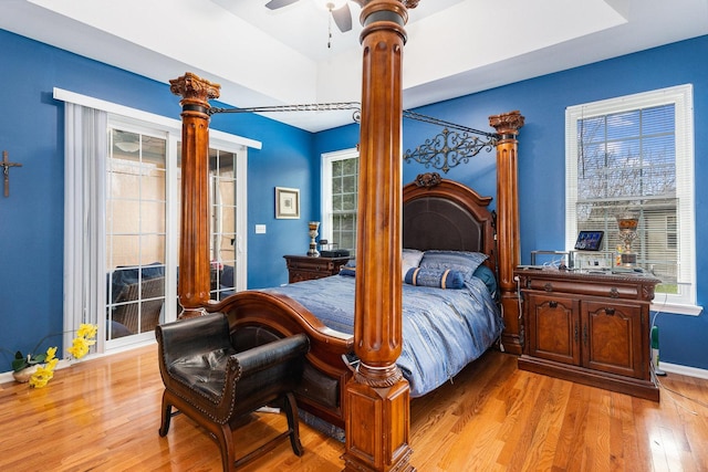 bedroom with ceiling fan and light wood-type flooring