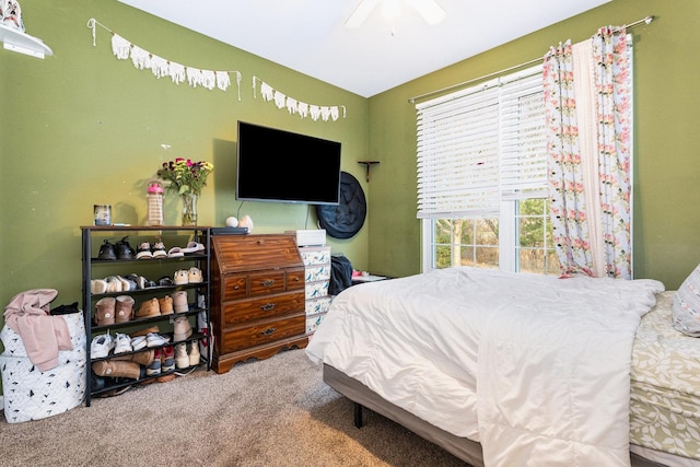 carpeted bedroom featuring ceiling fan