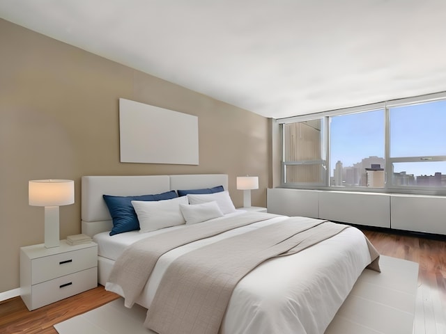 bedroom featuring light wood-type flooring