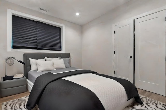 bedroom featuring light wood-type flooring