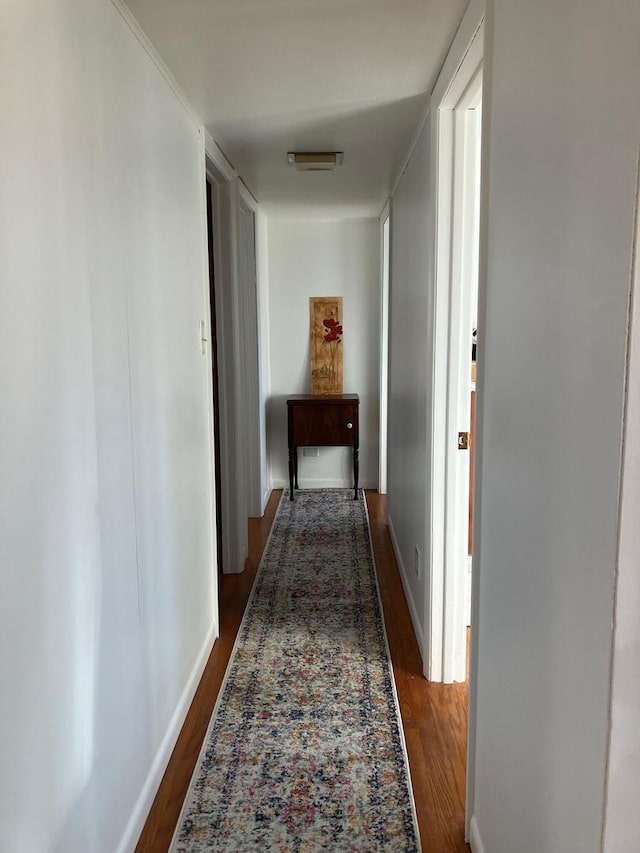 hall featuring dark hardwood / wood-style floors