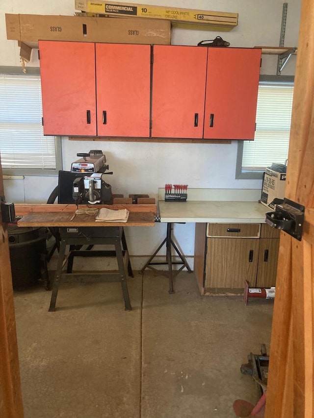 kitchen featuring concrete floors