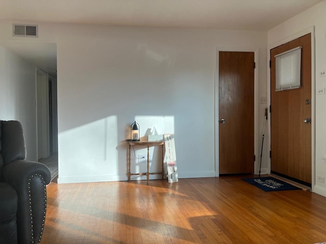 entrance foyer with hardwood / wood-style floors