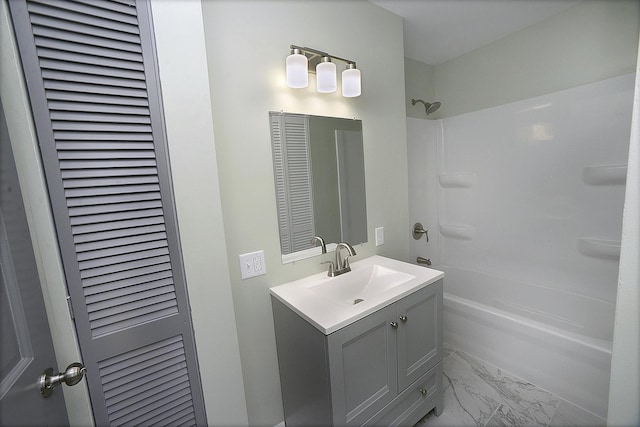 bathroom featuring vanity and tub / shower combination