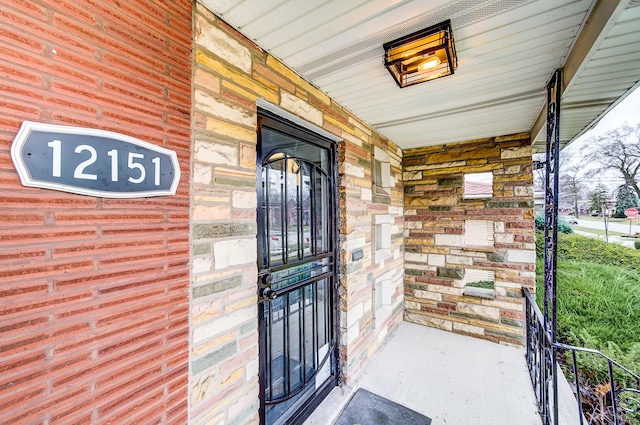 entrance to property with covered porch