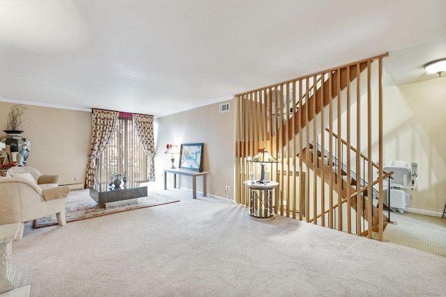 carpeted living room with a baseboard radiator and ornamental molding