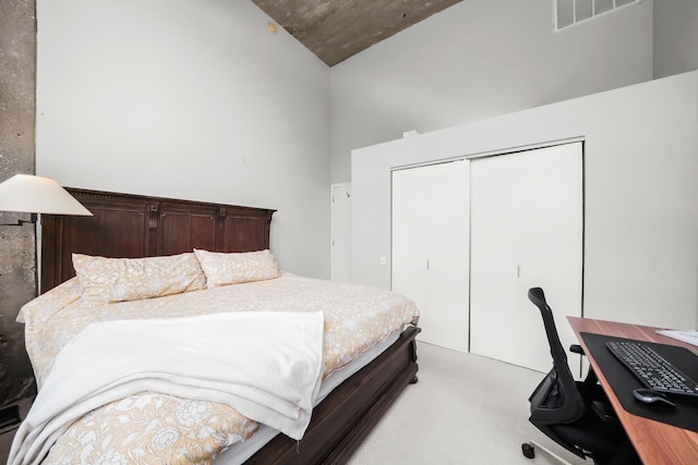 carpeted bedroom with a closet