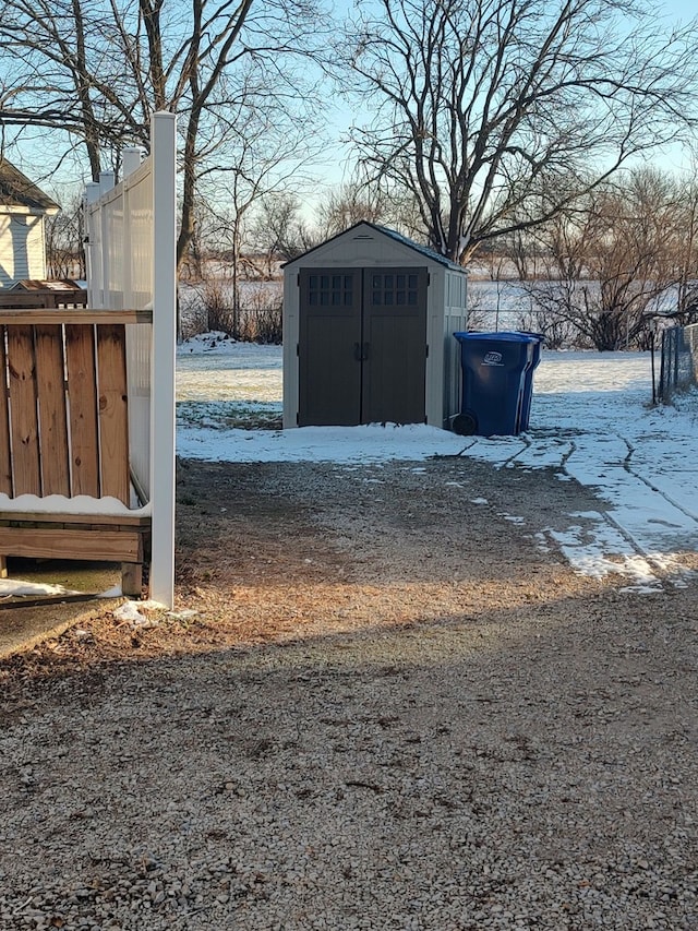 view of yard layered in snow