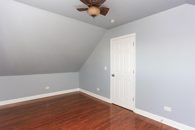 bonus room with ceiling fan, dark wood-type flooring, and lofted ceiling