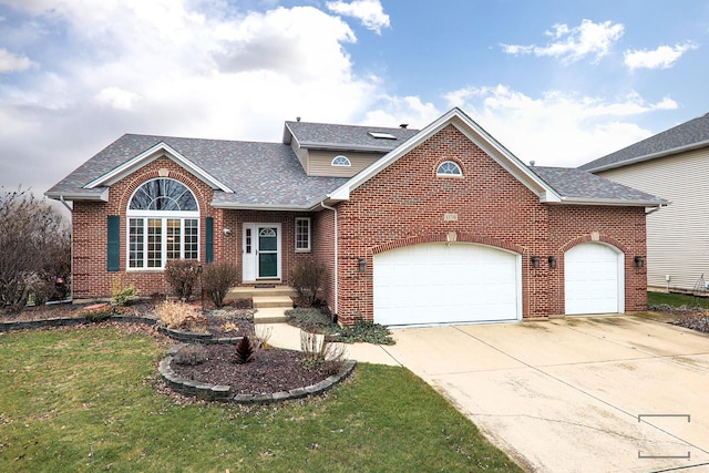 front facade with a garage and a front lawn