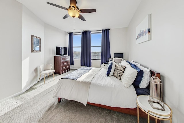 bedroom with ceiling fan and carpet