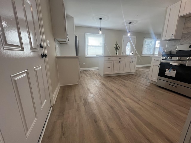 unfurnished living room with dark wood-type flooring