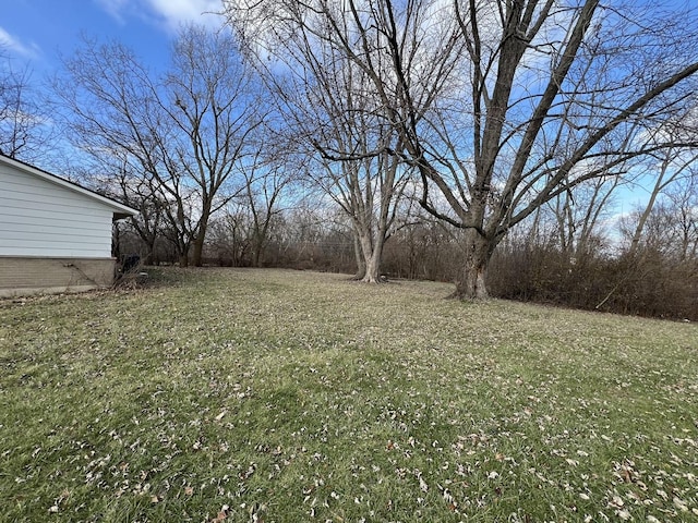 view of front of property with a garage and a front lawn