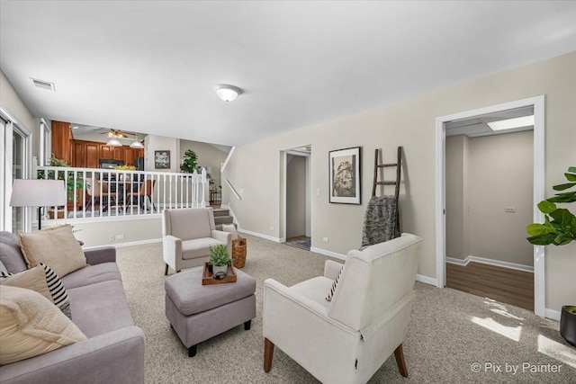 1154 Dovercliff Way, Crystal Lake, IL 60014 - living room featuring light carpet, a ceiling fan, and stairs