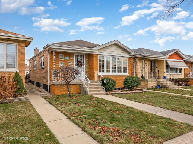 view of front of property with a front lawn