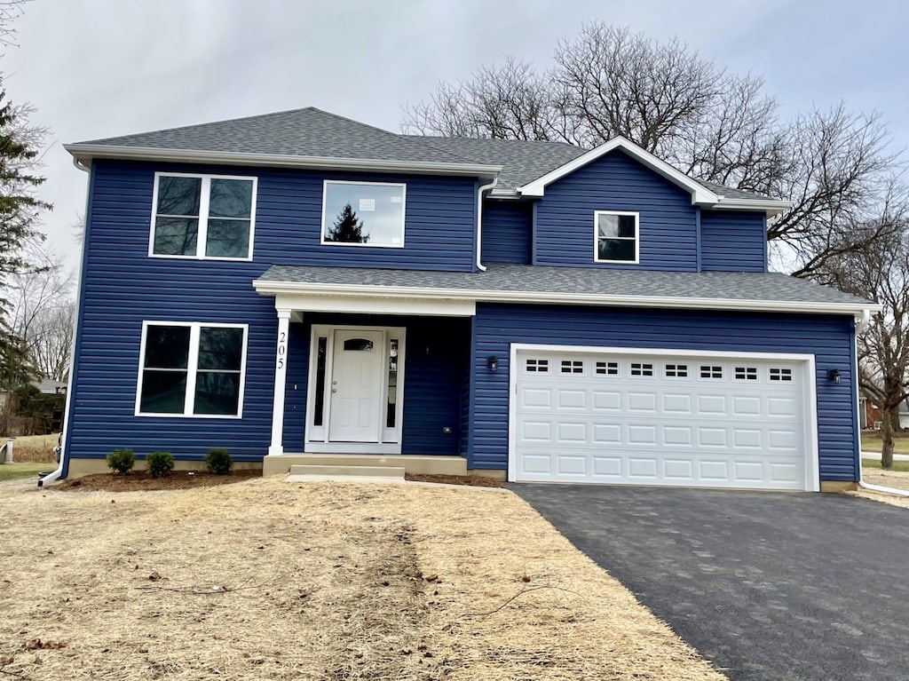 view of front property with a garage