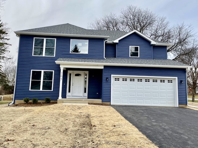 view of front property with a garage