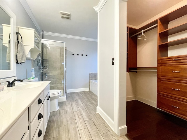 full bathroom with toilet, vanity, shower with separate bathtub, and ornamental molding