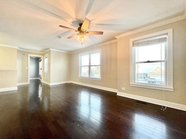 empty room with crown molding, ceiling fan, and dark wood-type flooring