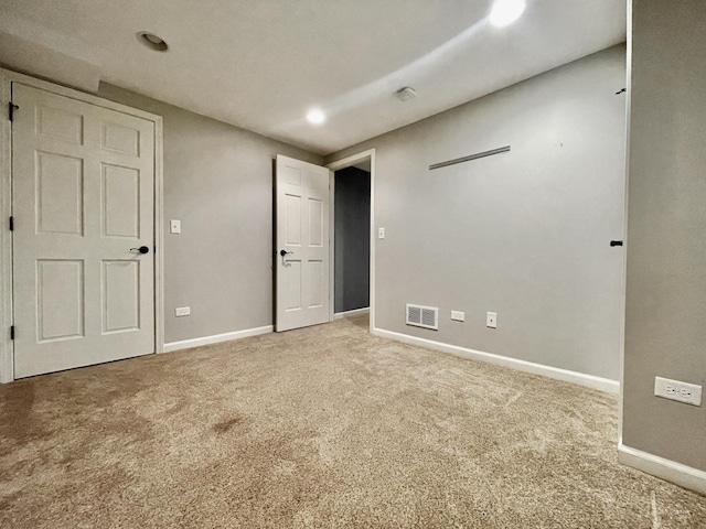 unfurnished bedroom featuring carpet flooring