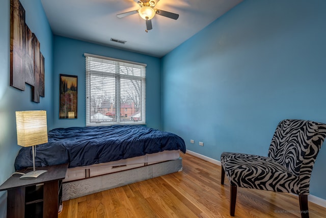 bedroom featuring ceiling fan and light wood-type flooring