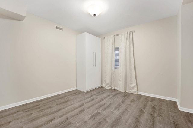 empty room featuring light hardwood / wood-style flooring